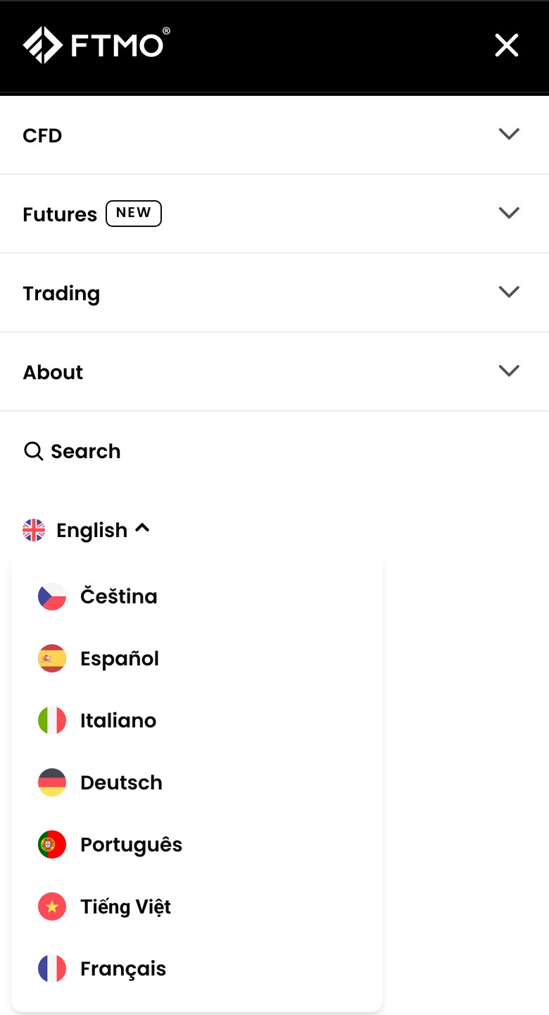 FTMO公式サイトのメニューにある言語の一覧（スマホ表示）。Englishの下に、Čeština、Español、Italiano、Deutsch、Português、Tiếng Việt、Françaisが並び、日本語は無い